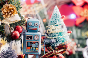 Christmas background with decorations and gift boxes on wooden