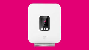 White T-Mobile mesh wifi extender with signal strength indicator.