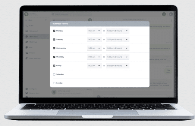 Laptop screen with Phone.com desktop app and schedule.