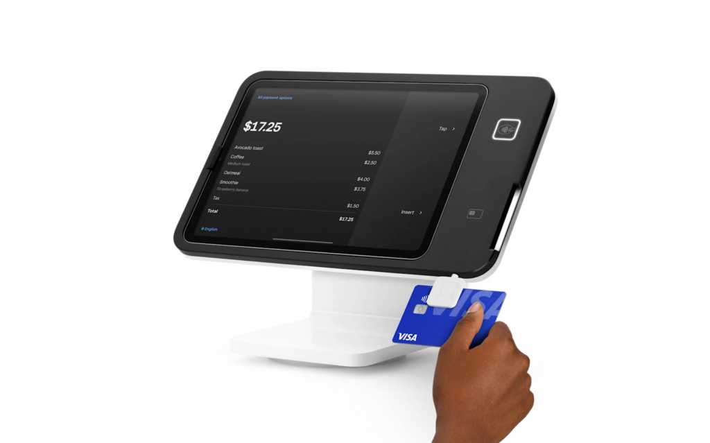 Square Stand POS with iPad display and built-in card reader processing a chip card payment