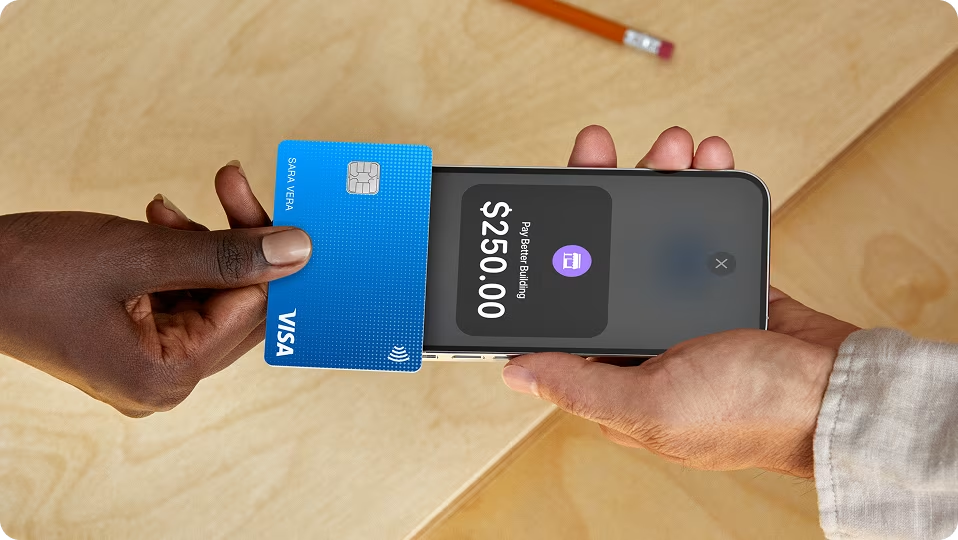 Customer making a contactless payment using Square POS tap-to-pay on a smartphone.
